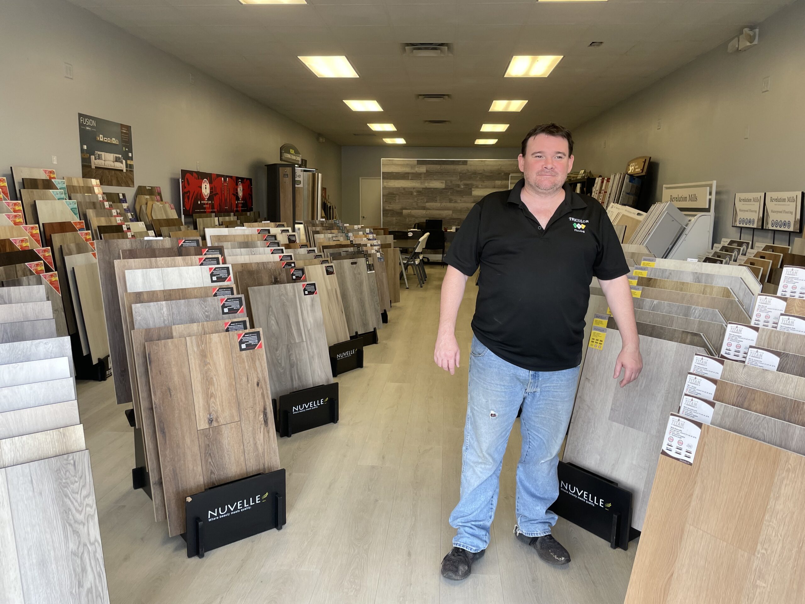 tricolor flooring sample display with brian  in our showroom